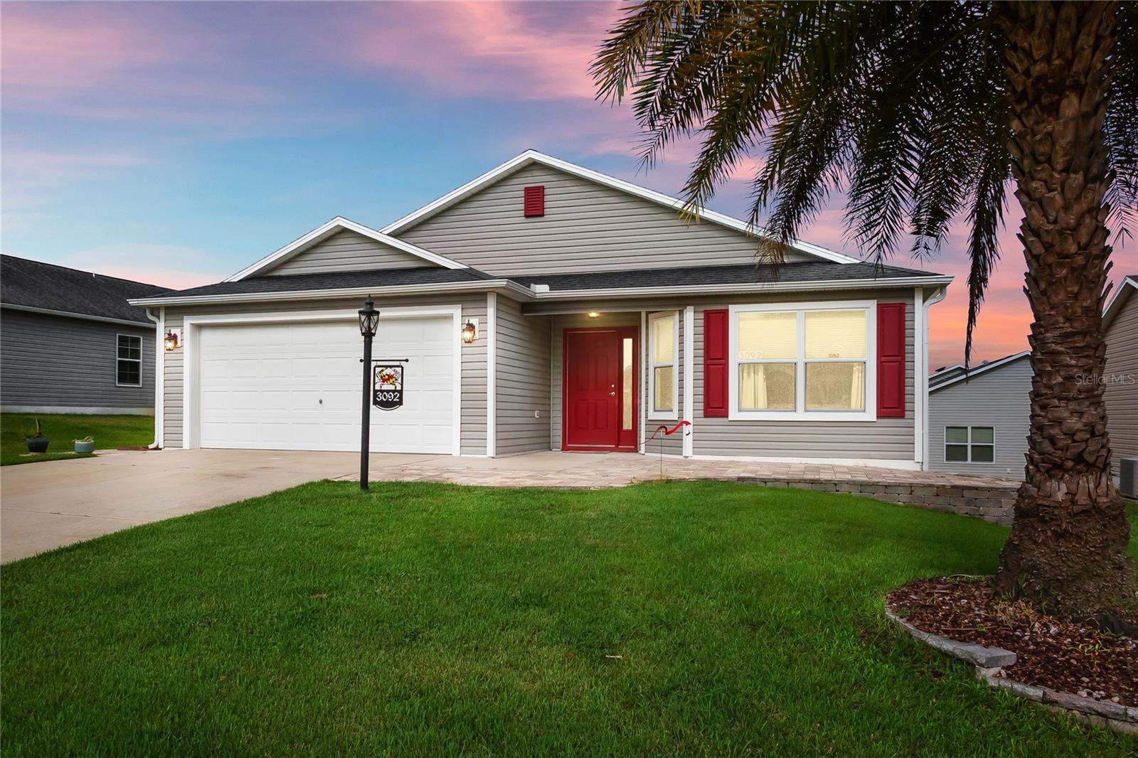 Exceptional Seabreeze Model in the Village of Pine Ridge – Beautifully Upgraded & Move-In Ready!
Welcome to 3092 Kramer Court — a stunning, meticulously maintained 3-bedroom, 2-bath Seabreeze model located on a quiet cul-de-sac in the highly desirable Village of Pine Ridge in The Villages, Florida. This thoughtfully updated home offers a perfect combination of comfort, style, and functionality, with premium features and upgrades inside and out.
Step into an open-concept floorplan filled with natural light, enhanced by neutral tile flooring throughout the main living areas and plush carpet in the two guest bedrooms (installed in 2021). The heart of the home — the spacious kitchen — was fully remodeled in March 2023, featuring granite countertops, custom soft-close cabinetry, updated backsplash, modern under-mount sinks, and new high-efficiency toilets in both bathrooms.
The chef in the family will appreciate the KitchenAid stainless steel appliances, including the dishwasher, microwave, and range (2021), along with a Whirlpool refrigerator (2023). Elegant pendant lighting (2022) adds ambiance to the kitchen island, perfect for casual dining and entertaining.
The bathrooms are equally impressive, each offering tiled walk-in showers (completed in 2019), updated vanities with granite counters, and a sleek, contemporary look that complements the rest of the home. The interior was professionally painted in 2021, creating a warm and cohesive aesthetic throughout.
This home is truly move-in ready with numerous recent upgrades, including:
• Lanai pavers installed in 2023 – a great space for morning coffee or evening relaxation
• Front paver walkway (2021) adds curb appeal and welcoming charm
• Gutters installed in 2021 for improved drainage and home protection
• Custom window shades (2022) for comfort and privacy
• Upgraded garage and light post fixtures (2022) for safety and style
• New smoke detectors (2025) for enhanced peace of mind
Enjoy the Florida lifestyle year-round in the covered lanai or take a stroll through this quiet and friendly neighborhood. The Village of Pine Ridge offers close proximity to golf courses, recreation centers, shopping, dining, and nightly entertainment — all accessible by golf cart!
Whether you’re looking for a seasonal escape or a full-time residence, this beautifully appointed home checks all the boxes.
Don’t miss the opportunity to own this one-of-a-kind Seabreeze model — schedule your private showing today!