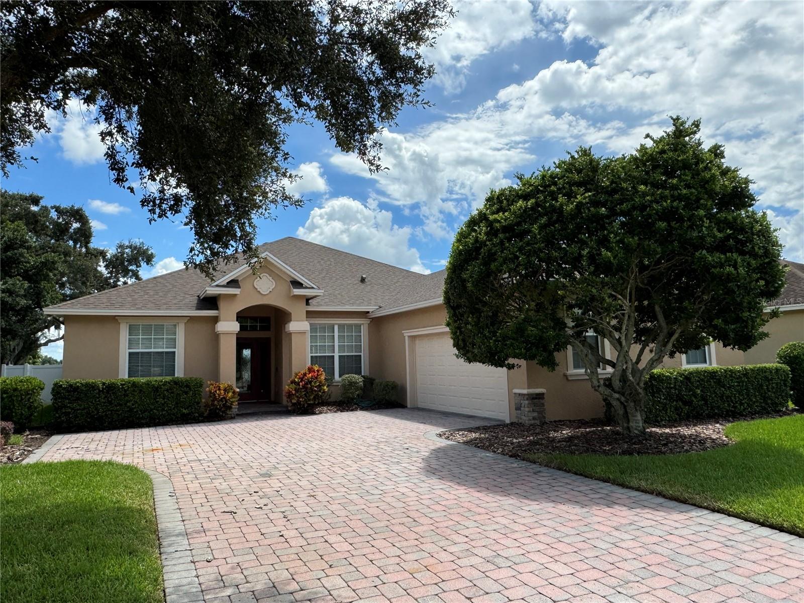 Southwest Lakeland Gated Community Morgan Creek Preserve. Beautiful Custom Home with 3 bedrooms, 2 baths, Large Screen Lanai and a side entry 2 car garage. Foyer opens to the Dining area and a Living area that could serve also as an office space. Spacious Kitchen with 42" wood cabinets, granite counters, walk-in pantry and overlooks the breakfast nook and Family Room. Perfect for entertaining both inside and outside on the expansive screen patio lanai. Primary suite is large with access to the back patio. The primary bath has separate vanities, garden tub with separate walk-in shower. The secondary bedrooms are ample size with great closet space located on the opposite side of the home from the primary. Paver driveway to the 2-car garage. Wood trim millwork accents & crown molding throughout this home. This home has been incredibly well maintained. Morgan Creek is a sought-after neighborhood with very nice amenities including community pool, tennis court and playground. Great location convenient for shopping, dining, entertainment, medical and access to major roads for easy commute to Orlando, Tampa. Lawn Care Included Schedule a showing today!