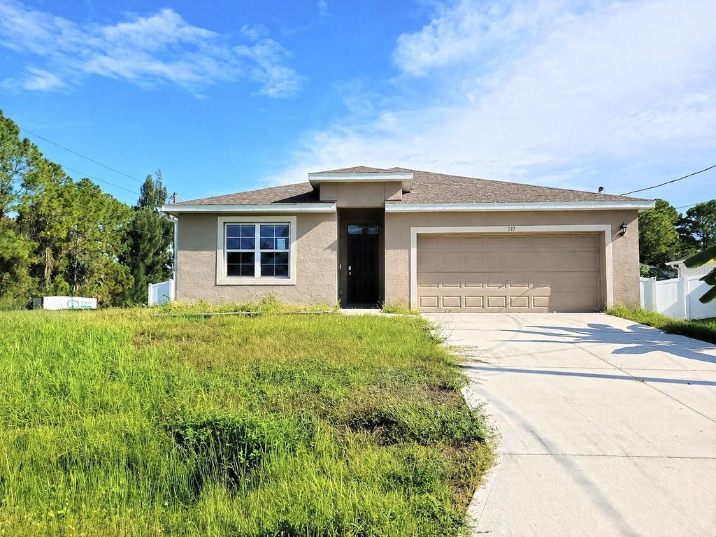 Photo of 597 J T Sancho Street SW, Palm Bay, FL 32908 (MLS # O6448298)