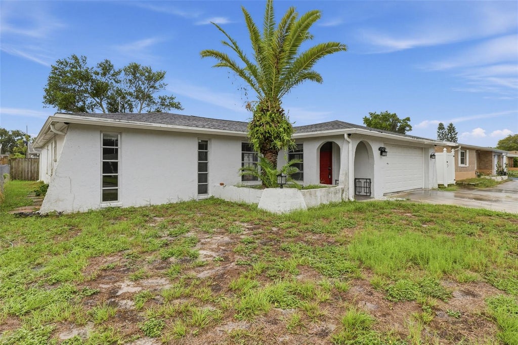 Photo of 7340 Mayfield Drive, Port Richey, FL 34668 (MLS # O6448882)