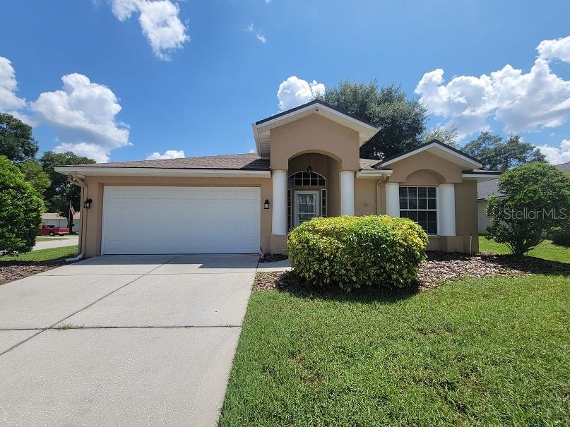 Don't miss this stunning 3-bedroom, 2-bathroom home nestled on an oversized, beautifully landscaped corner lot in a peaceful golf course community—just minutes from the Suncoast Parkway for easy commuting!
Inside, you’ll find a spacious and inviting open layout with vaulted ceilings, split bedrooms, and stylish 12x6 ceramic tile flooring throughout. The neutral color palette creates a clean, modern backdrop ready for your personal touch. The generously sized kitchen is a standout feature, offering ample cabinetry, stainless steel appliances, a built-in desk, pantry, and a raised breakfast bar. A separate formal dining area sits just off the kitchen for added convenience. Two guest bedrooms and a full bath are located at the front of the home, while the private owner’s suite is tucked away at the rear. The primary suite features a large walk-in closet and an en-suite bath with a soaking tub, separate shower, and dual vanities. An inside laundry room is off of the 2 car garage. Step outside to the tiled screened patio, accessible from the living room, kitchen, or master bedroom—ideal for outdoor entertaining.
Roof and hot water heater replaced in 2022!
Low HOA fees with ample community amenities (clubhouse, pool, tennis courts and more!)