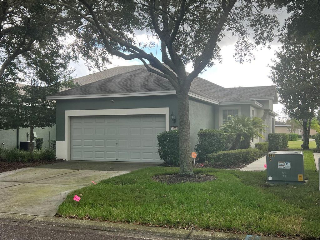 Photo of 13719 Crest Lake Drive, Hudson, FL 34669 (MLS # TB8434775)