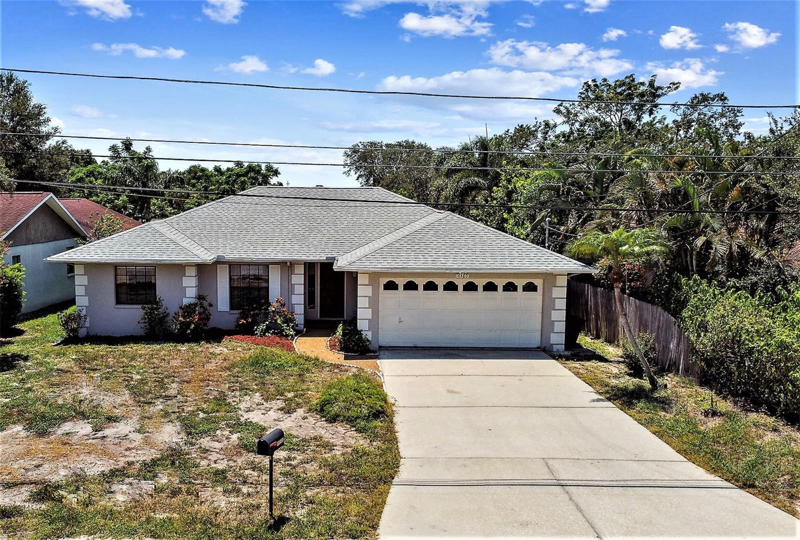 Location, location, location! Rarely on the market in this tucked away neighborhood of Largo, this spacious home boasts a BRAND NEW ROOF (July 2023) and 9,165 SF lot. Located just 1.5 miles from beautiful Indian Rocks Beach, not in a flood zone and NO HOA! Generous sized kitchen with dining nook and laundry for maximum convenience! Kitchen is open to the living area which looks out to the enclosed porch and sprawling backyard. Spacious primary bedroom featuring large walk-in close, ensuite bathroom and its own enclosed patio. Three good sized bedrooms and full bath. The oversized backyard is just begging for a pool. This home is ready and waiting for new owners to put their personal touch on it. Hot water heater is one month new, HVAC 5 years.