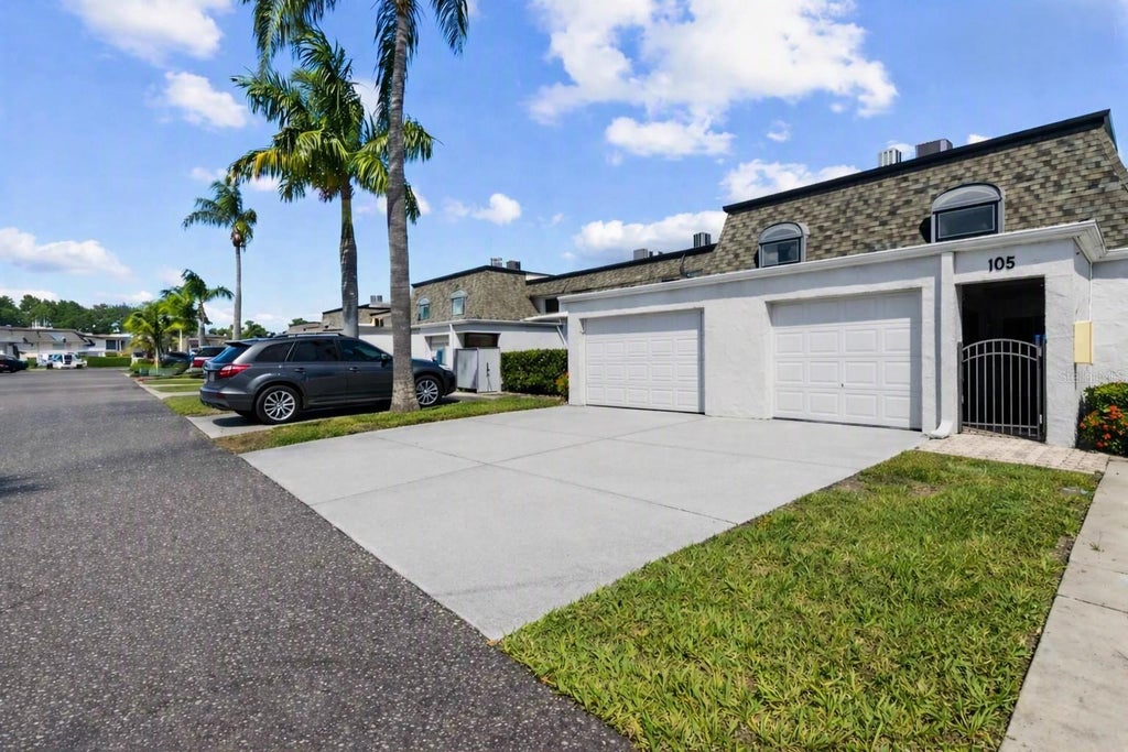 Photo of 2980 Haines Bayshore Road #105, Clearwater, FL 33760 (MLS # TB8558576)