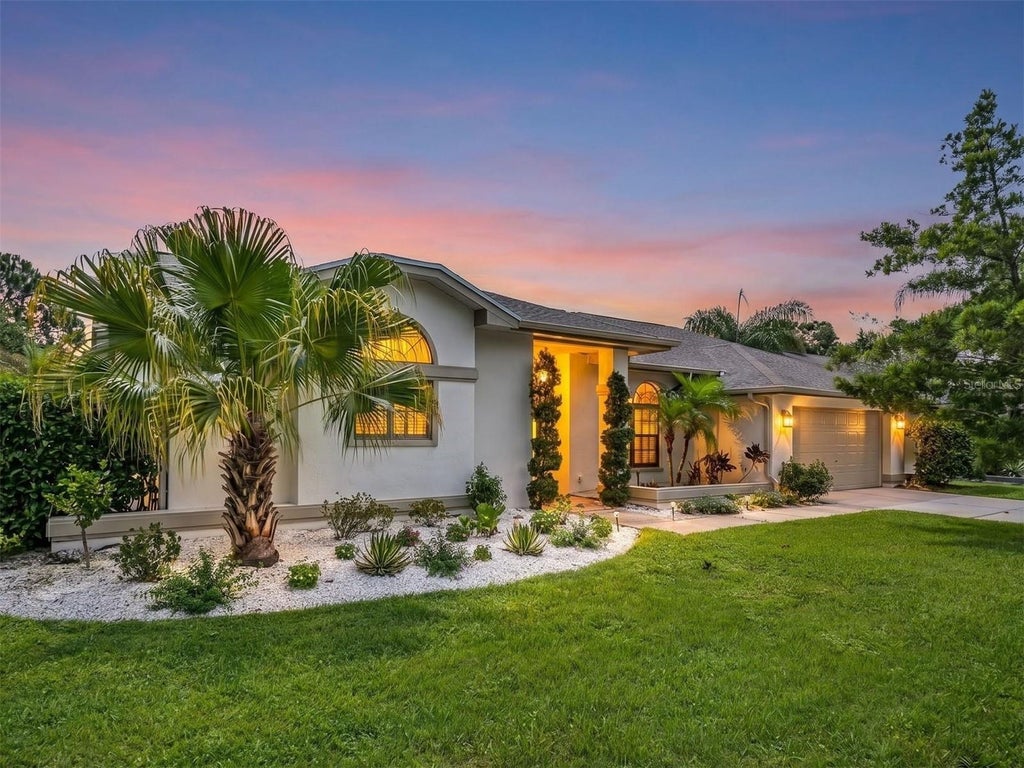 Photo of 447 Whispering Lakes Boulevard, Tarpon Springs, FL 34688 (MLS # TB8514762)