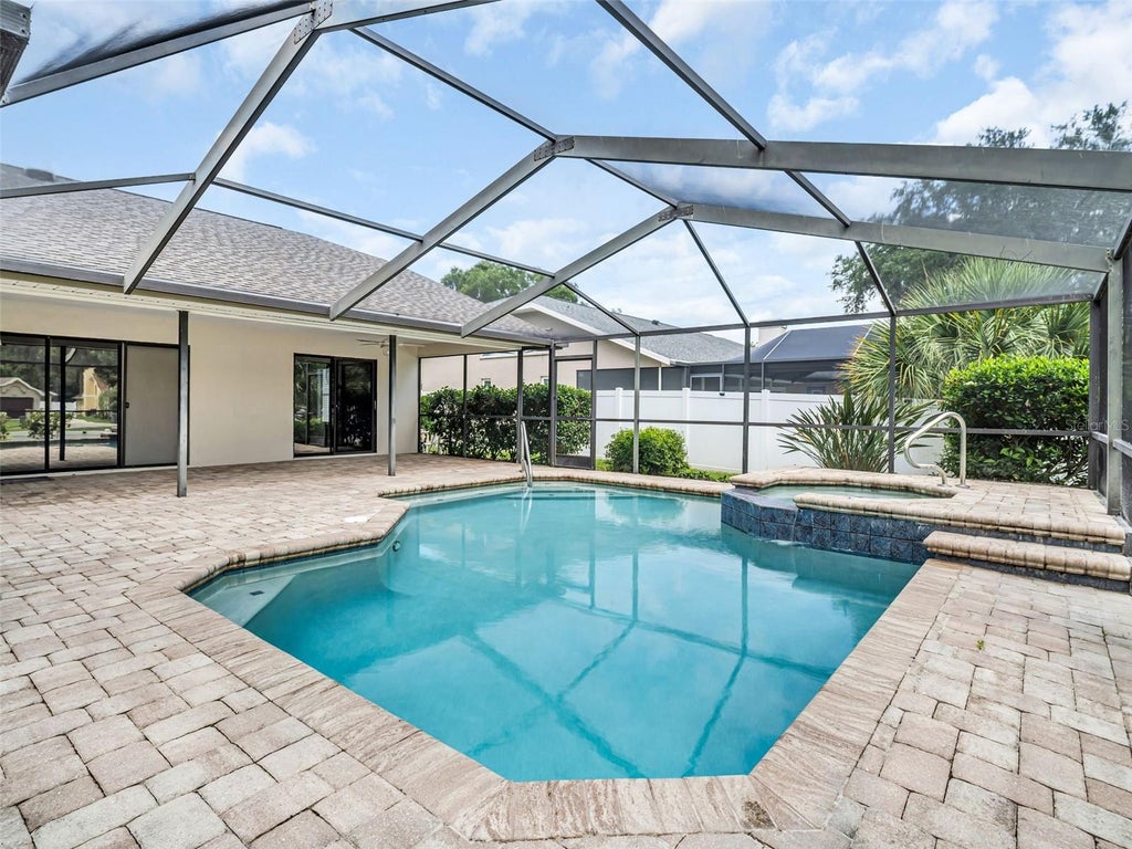 Photo of 447 Whispering Lakes Boulevard, Tarpon Springs, FL 34688 (MLS # TB8514762)