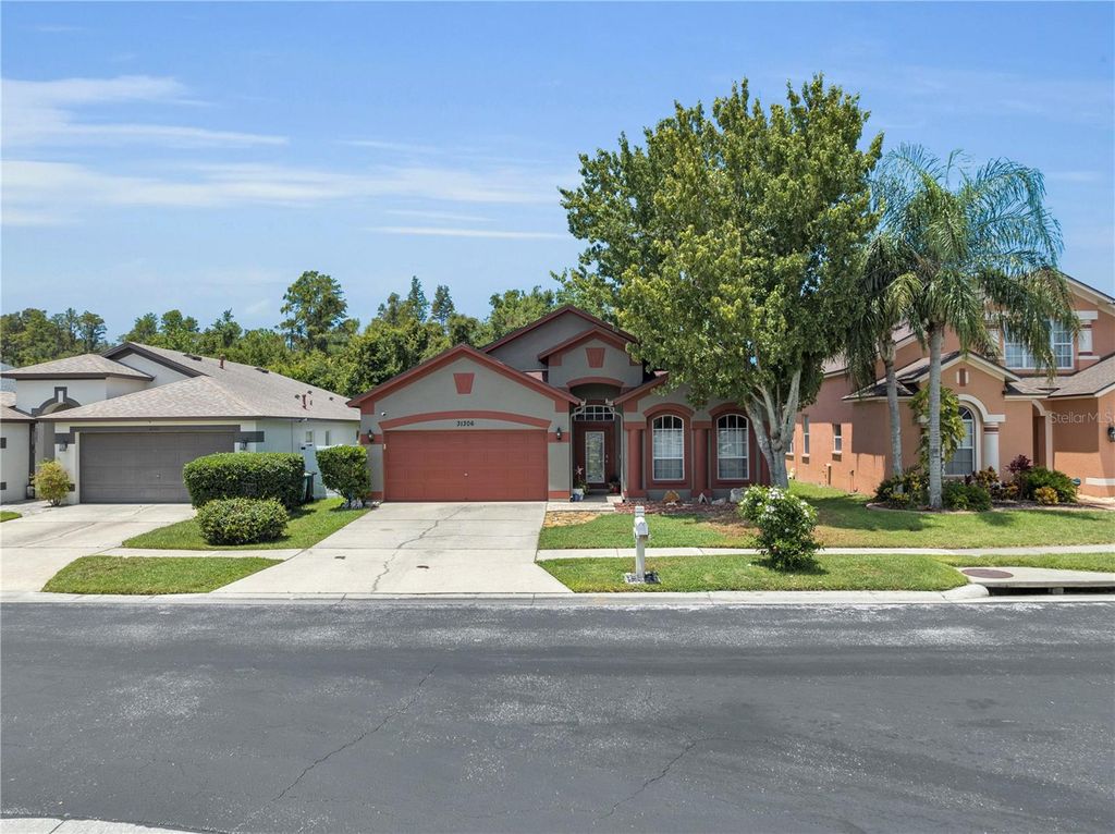 Photo of 31306 Heatherstone Drive, Wesley Chapel, FL 33543 (MLS # TB8412251)
