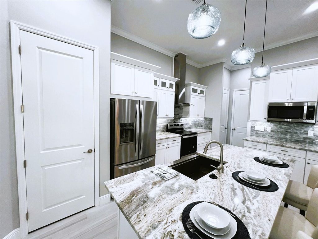 Photo of 250 Rotonda Boulevard E, Rotonda West, FL 33947 (MLS # D6145566)