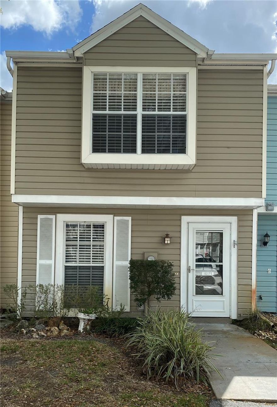 Welcome to your new home in the highly sought-after NORTHDALE neighborhood! This home features 2 bedrooms, 2 full baths, and 1 half bath. New A/C installed in 2023. Updated primary bath, stainless steel kitchen appliances, and French doors leading outside. A chair lift is conveniently installed for accessibility to the 2nd floor, but can be removed at buyers request. Some minor updates could truly make this your dream home! Just steps from the community pool, with indoor laundry and low yard maintenance.  Villas of Northdale is conveniently located with easy access to I-275 or the Veteran's Expressway. The neighborhood is near the YMCA, Sam's Club, Target, and the Northdale Golf & Tennis Club. Centrally located less than 20 miles to downtown Tampa. Schedule your appointment to see this home before it's too late!