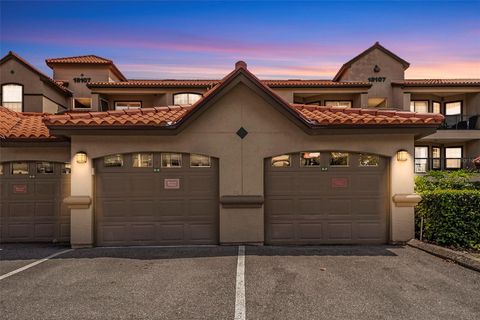 Photo of 18107 Peregrines Perch Place #6101, Lutz, FL 33558 (MLS # TB8429059)