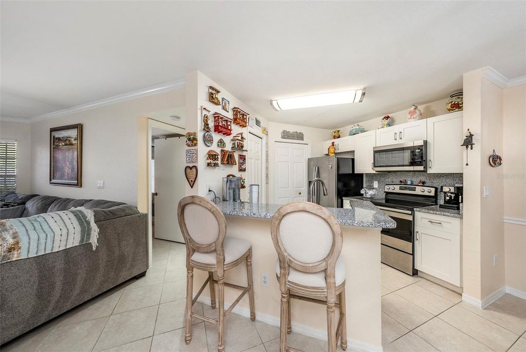 Photo of 18107 Peregrines Perch Place #6101, Lutz, FL 33558 (MLS # TB8429059)