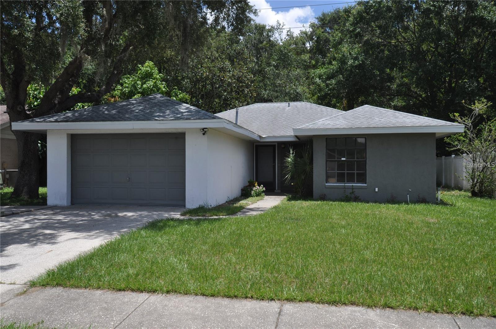 Refreshed 3/2 with tile floors throughout, split plan, open kitchen with breakfast bar and nook as well as closet pantry, screened lanai, and 2 car garage. Approval subject to credit, rental verification, employment, and background. Must make 3 times the monthly rent as income. No trampolines and no above ground pools.