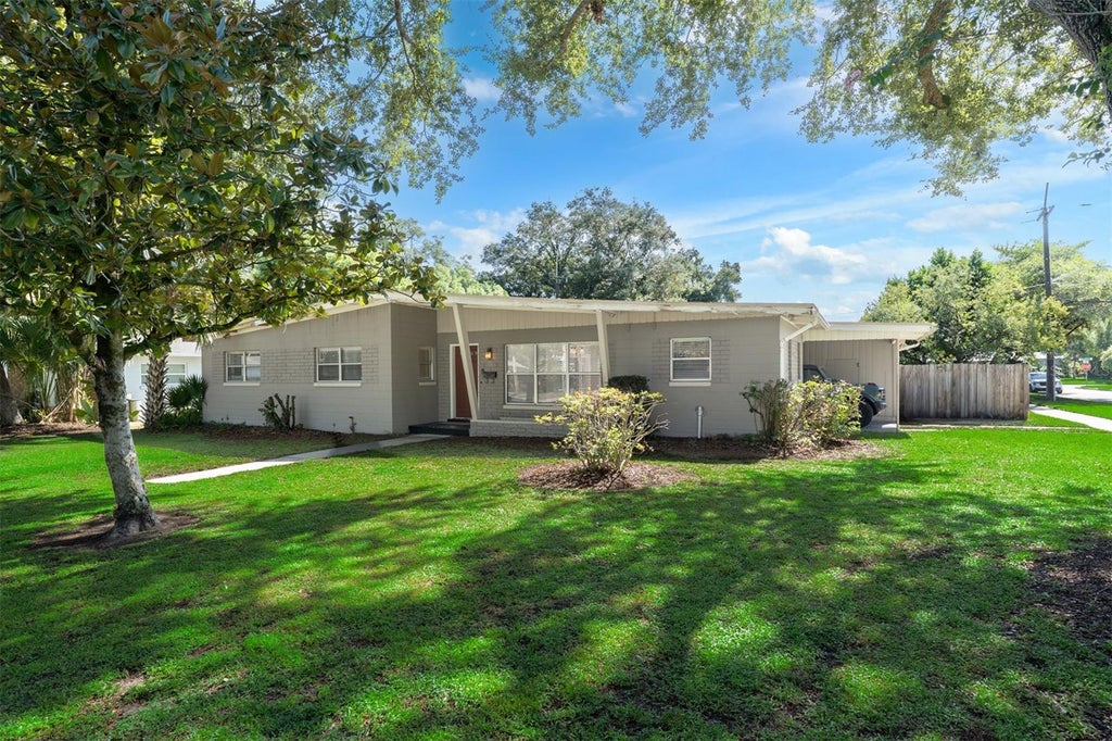 Photo of 1209 S Crystal Lake Drive, Orlando, FL 32806 (MLS # O6427657)