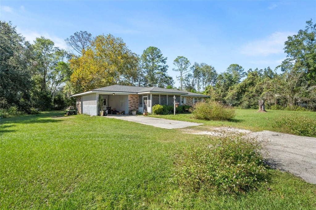 Photo of 140 SW Quincy Terrace, Lake City, FL 32024 (MLS # A4710515)