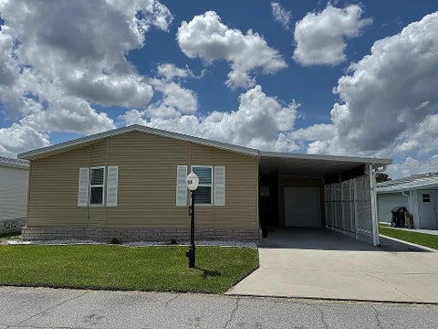 Photo of 57 Straphmore Drive, Haines City, FL 33844 (MLS # O6428526)
