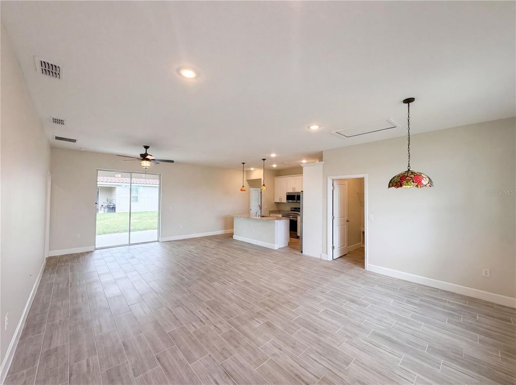 Photo of 446 Cinnamon Drive, Kissimmee, FL 34759 (MLS # O6410740)