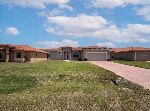 Photo of 446 Cinnamon Drive, Kissimmee, FL 34759 (MLS # O6410740)