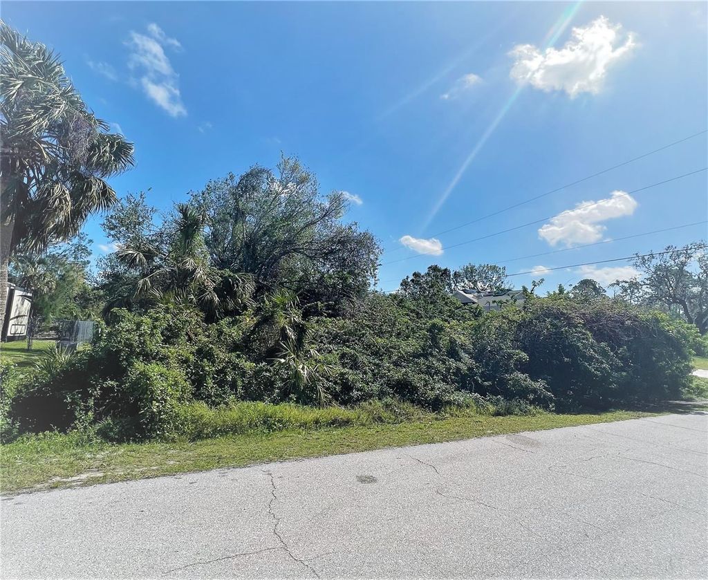 Photo of 3438 Dunkirk Street, Port Charlotte, FL 33980 (MLS # C7471037)