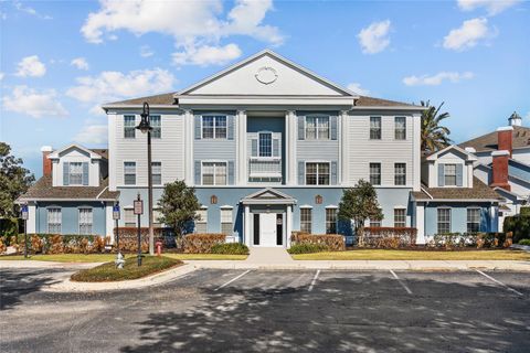 Photo of 1597 Heritage Crossing Court #302, Reunion, FL 34747 (MLS # O6386227)