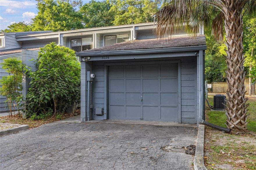 Don’t miss this rare 3 bedroom 2 ½ bath end unit updated townhouse WITH a garage located in the northwest community of Tiffany that is right on the RTS bus route and 10 minutes from the University of Florida and Shands.  The spacious master suite has a large walk in closet and master bath. Features include indoor laundry room, front courtyard, and updates in the kitchen and bathrooms. Two sets of sliding glass door open up to a large patio.  New siding being installed by the HOA.  HOA fees cover exterior maintenance, pool, clubhouse, and roof.  This unit is a PUD not a condo and can qualify for FHA financing.