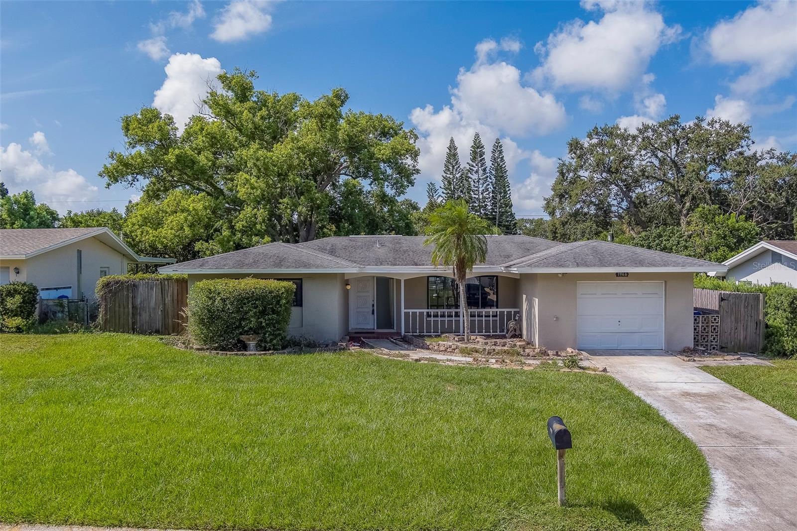 Welcome to this pool home located in one of Largo’s most desirable neighborhoods! Featuring 2 spacious bedrooms, 2 full bathrooms, and a 1-car garage, this home offers comfort, convenience, and the perfect Florida lifestyle. Step inside to find terrazzo and tile flooring throughout, creating a clean and timeless look with easy maintenance. The updated master bathroom adds a touch of modern elegance, while the large living room boasts a picturesque window overlooking the sparkling pool, filling the space with natural light. Enjoy casual dining in the cozy breakfast nook just off the kitchen, perfect for morning coffee or a quick bite. The AC was replaced in 2020. Step outside to your own private oasis—relax under the covered lanai or soak up the sun poolside in the large, fully fenced backyard, ideal for entertaining, pets, or play. Located just minutes from Belleair Beach, restaurants, shopping, parks, and golf courses, this home truly has it all. Whether you're a first-time buyer, looking to downsize, or searching for a vacation retreat, don’t miss this opportunity! Schedule your private showing today—this gem won’t last long!