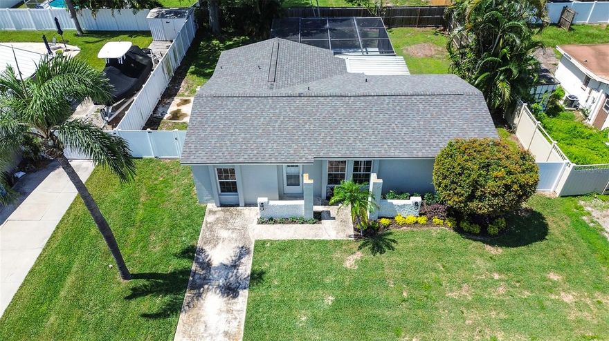 One or more photo(s) has been virtually staged. FINALLY!!! An affordable 3 bedroom, 2 bathroom POOL home in the heart of Pinellas Park! This beautiful home has been fully remodeled from head to toe. As you step inside, you are greeted with the warmth of all-new luxury vinyl plank flooring that flows seamlessly throughout the entire space. Freshly painted walls, both inside and out, and a clean and modern touch enhancing the overall appeal of the home. With an open floor plan perfect for entertaining guests complete with a fully renovated kitchen featuring all new solid wood kitchen cabinets, stainless steel appliances and quartz countertops. The large master bedroom is right off of the kitchen with its own private en suite bathroom and walk in closet. On the other side of the home you will find two more bedrooms and a second bathroom that has also been completely remodeled. Step outside to your own private retreat. With a gorgeous pool that has been recently refinished, large bird cage to keep out debris and a fully fenced in backyard, the possibilities are endless. BRAND NEW ROOF IN DECEMBER 2024, all new duct work and insulation!! NOT IN A FLOOD ZONE!!! Minutes to great shopping, endless dining options, downtown St Petersburg and a short drive to Florida’s iconic beaches! Come take a look before its gone.