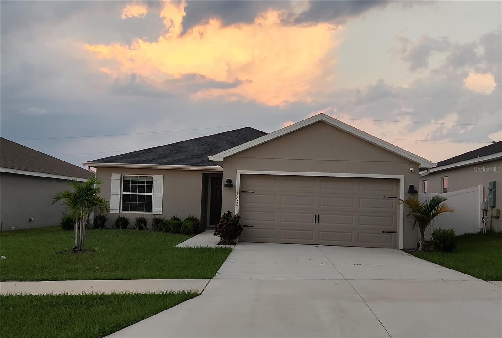 Amazing Single Home 4-bedroom, 2-bathroom, 2- Car Garage home your own. This beautifully maintained single-story home in the desirable Summerview Xing community! Built in 2020, just minutes away from DISNEY WOLD PARK ATTRACTIONS! This place is perfect for you! Natural light dances through the open living and dining areas, creating a warm and inviting atmosphere complemented by modern fixtures and finishes. Open floor plan, the floors include laminate on the floors. Kitchen appliances include a Modern stainless-steel appliance with Double Door Refrigerator, spacious stylish cabinets, and countertops. Convenient breakfast bar perfect for fueling up before a day of Disney Adventures. All bedrooms include laminate and are a good size. The master bedroom has a big walk-in closet, a private bathroom, shower, sinks, and modern finishes providing a relaxing retreat after a long day. The laundry is inside. Beyond the home's comforts, the location offers easy access to local amenities, shopping centers, dining options, schools, hospitals, with the added charm of being close to the magic of Walt Disney World. The allure of living near the iconic theme park adds an extra layer of enchantment to this already desirable property. Very convenient location, very short driving distance to I-4 to Orlando, Tampa is very close to visit Bush Garden, and the beach. Excellent, excellent location! *Renters insurance required*. This property won’t last long, make this town house your new home and call us TODAY!!! Work, Laugh, and Play in Haines City! Schedule your private showing today and experience the relaxing, and tranquility this exceptional home.