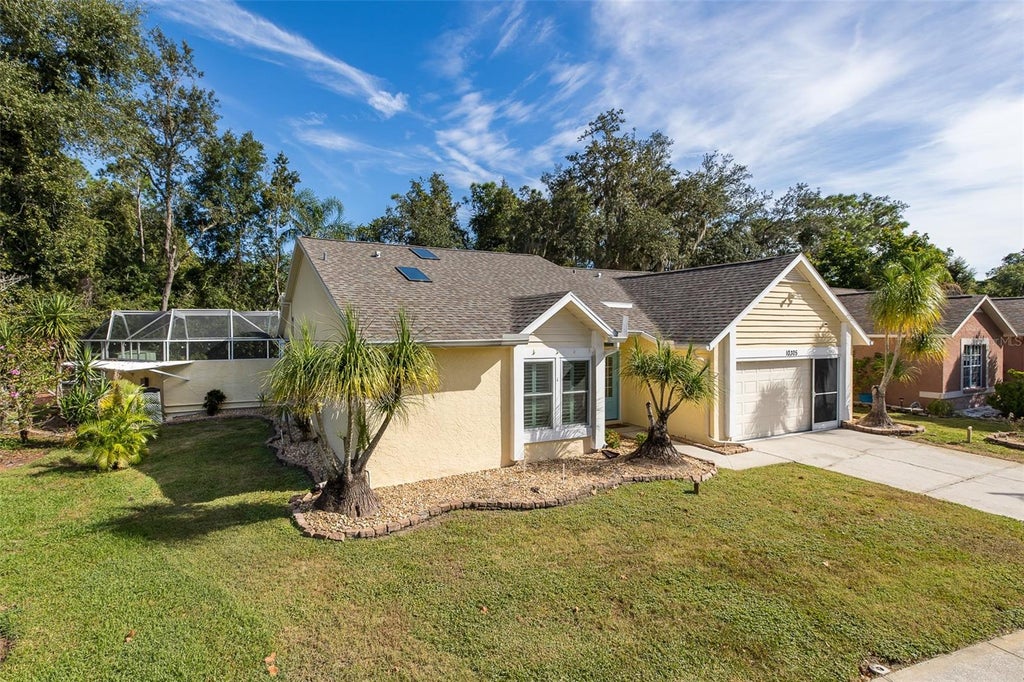Photo of 10305 Copperwood Drive, New Port Richey, FL 34654 (MLS # TB8553887)