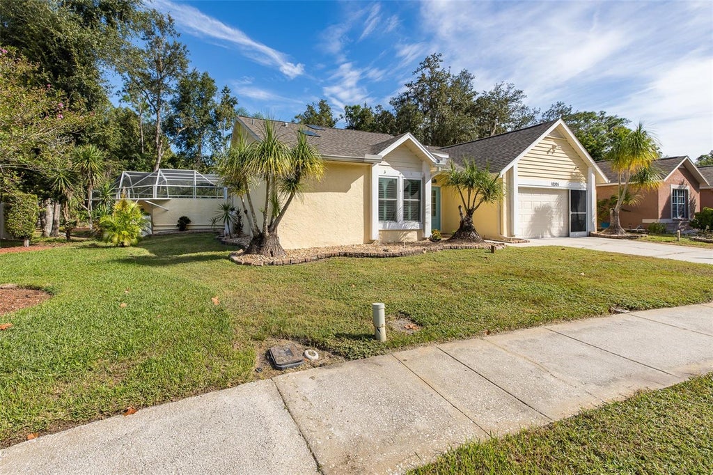Photo of 10305 Copperwood Drive, New Port Richey, FL 34654 (MLS # TB8553887)