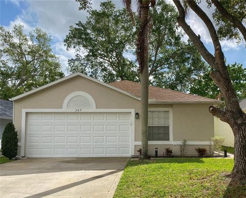 Photo of 347 Cypress Point Dr, Melbourne, FL 32940 (MLS # O6388419)