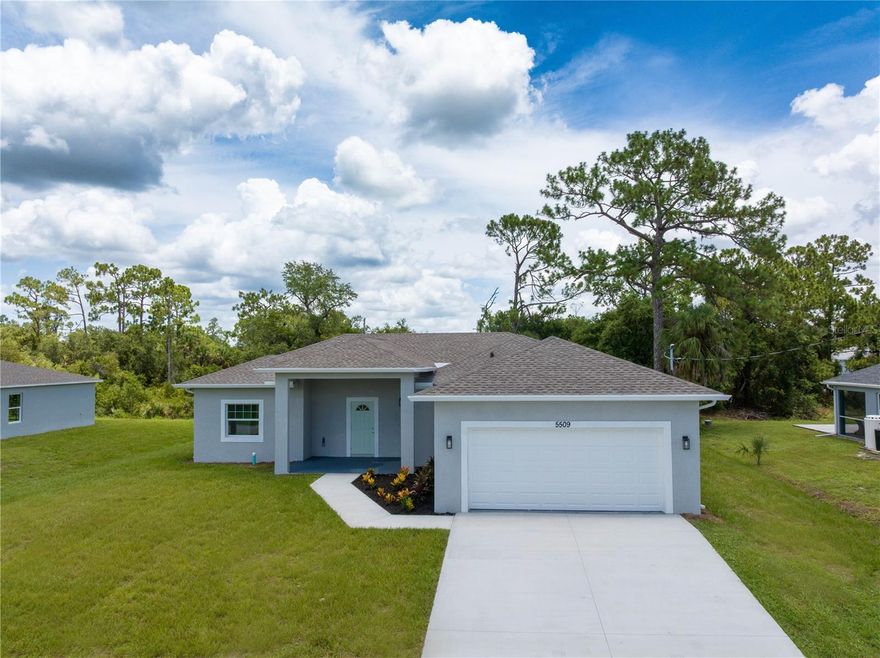 Step into this stunning custom-built home where thoughtful design meets elegant finishes. From the moment you arrive, you'll appreciate the attention to detail—from sleek stainless steel appliances to designer lighting and a luxurious primary bath that exudes spa-like tranquility. Start your mornings soaking in the sunrise through impact-rated glass doors or enjoy coffee on the peaceful rear patio. The heart of the home is a spacious open-concept great room, perfect for gathering and entertaining. A chef’s dream kitchen features a large island and a generous walk-in pantry offering ample storage for all your culinary needs. This home is designed for comfort and convenience, featuring three full bathrooms, giving each bedroom its own private retreat. Durable luxury vinyl flooring flows throughout, combining style with low-maintenance living. Built with safety and peace of mind in mind, you'll enjoy impact windows and doors, offering storm protection and insurance savings. Located in one of the fastest-growing cities in the U.S., this North Port gem is just a short drive from the Atlanta Braves Spring Training Stadium, the white-sand beaches of Englewood and Venice, and the exciting new Sunseeker Resort. Live the Florida lifestyle in a home that has it all—comfort, beauty, and unbeatable location.