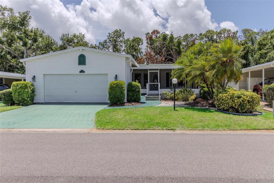 Expect to be impressed with this one-of-a-kind 3-bedroom, 2-bath split-bedroom 1760 sq ft home in sought-after Imperial Lakes Estates! This land-owned 55+ community offers resort-style living with two heated pools, a Jacuzzi, pickleball and tennis courts, an active clubhouse, and is beautifully surrounded by a scenic 65-acre lake.
A welcoming screened porch greets you upon entry and sets the tone for the inviting interior. Step inside to an open-concept layout featuring a spacious eat-in kitchen and great room. The kitchen boasts a bright breakfast bay, abundant cabinetry, and a raised snack bar with seating for 5–6—perfect for entertaining.
The expansive great room and formal dining area showcase a built-in glass hutch and a wall of windows that fills the space with natural light. The split-bedroom design provides privacy, with two generously sized bedrooms and an oversized hall bath on one side of the home.
The serene primary retreat offers a tranquil escape, highlighted by a stunning wall of windows positioned behind the bed, creating a bright and airy ambiance. A spacious walk-in closet with custom organizer provides ample storage, while the private en-suite bath features dual vanities, a relaxing soaking tub, a walk-in shower, and additional cabinetry for added convenience.
A convenient first-floor laundry room with extra cabinetry is located just off the attached 2-car garage. Unwind in the peaceful sunroom overlooking Florida’s natural surroundings—your own private retreat. HOA includes cable and internet service. Convenient location offers easy access to dining, shopping, and I-75
Enjoy the perfect blend of space, comfort, and vibrant community living—this is Florida living at its best!