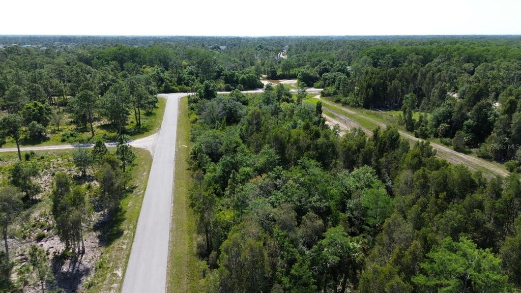 Photo of 482 Westchester Drive, Lehigh Acres, FL 33972 (MLS # TB8460877)