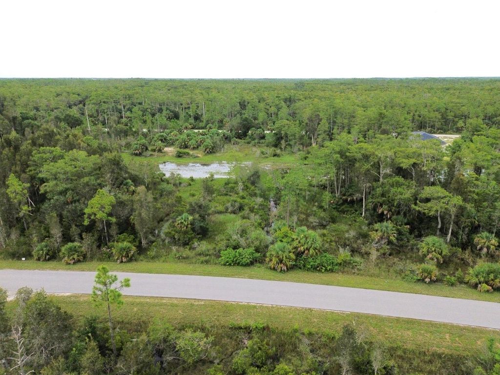 Photo of 482 Westchester Drive, Lehigh Acres, FL 33972 (MLS # TB8460877)