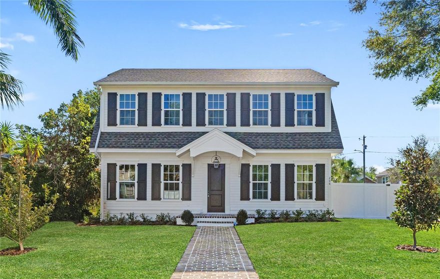 Under Construction. NON FLOOD ZONE! No flooding or water intrusion in this home from Helene or Milton. COMPLETION DATE: December 2024! Don’t miss the chance to make this your dream home with Canopy Builders - St. Petersburg's most TRUSTED name in luxury home construction. This NEW Dutch Colonial model on a corner lot, is (4) Bedrooms + Study + Loft, (3.5) Baths, a detached 2-car garage, a POOL plus an Accessory Dwelling Unit (ADU) with 1 bedroom and 1 bath. The main home boasts 3,186 sqft of living space and 591 sqft in the ADU (total of 3,777 sqft). In addition to the 1 bedroom and 1 bathroom, the ADU includes a full kitchen, pantry, laundry area, and a generous walk-in closet. Nestled in the Historic Old Northeast neighborhood, this stunning home is surrounded by the charm, and architectural beauty the area is famous for. Canopy’s expert design team, known for their style and elegance, has carefully crafted this home with beautiful finishes and designer details. As you enter, you’re greeted by a gold pendant above the black and white marble checkered floor. To the left of the entryway, you'll find the designated dining room with wainscotting detail, Grass cloth wallpaper, and a gorgeous gold fixture. To the right is a versatile bedroom/study with an ensuite bathroom adorned with gold hardware, a marble countertop, and complimentary shower tiles and flooring. The open floor plan, featuring a large kitchen with a spacious island, a great room, and a fireplace creates the perfect space for entertaining. The kitchen has custom cabinetry with an endless amount of cabinetry and storage in this beautifully designed kitchen. The kitchen features gold hardware, marble countertops, and a black and gold La Cornue range, adding a sleek touch. Adjacent to the kitchen is the expansive butlers’ pantry, showcasing cabinetry, marble countertops, and gold hardware accented by stylish hanging pendants. Nearby, a mudroom located near the back door offers additional storage space. There’s also an elegant powder bathroom with a floating soapstone vanity, intricate picture molding, and an inset mirror. Upstairs, you'll find a versatile recreational room with endless possibilities. Nearby, the laundry room features soapstone countertops, gold pendant lighting, storage space, and a sink. Also located on the upper floor is the expansive Primary Suite. It is a true sanctuary bathed in natural light, with a generous walk-in closet, double sink vanity, free-standing soaking tub, walk-in shower, and a water closet. Not one detail has been overlooked with a White Oak vanity, marble floors and countertops, and inset medicine cabinet mirrors. Every aspect of this new build has been meticulously planned, featuring a pre-designed finish package, Hardie Board plank siding, a tankless gas water heater, impact-resistant windows, engineered hardwood flooring throughout, and dual digital thermostats for independent climate control on both levels. Other luxury details include 10’ ceilings on the main level & 10’ ceilings on the second, an elegant gas sconce on the front porch, and 8’ interior doors. The expansive backyard, with a luxurious heated pool & spa, and an outdoor kitchen, provides plenty of space for lounging or entertaining guests. This home is just a 10 min WALK to downtown St. Pete and the scenic waterfront parks along Northshore. Enjoy a 20 min drive to St. Pete Beach and only 20 min to Tampa. Don’t miss this opportunity to make this breathtaking home yours!