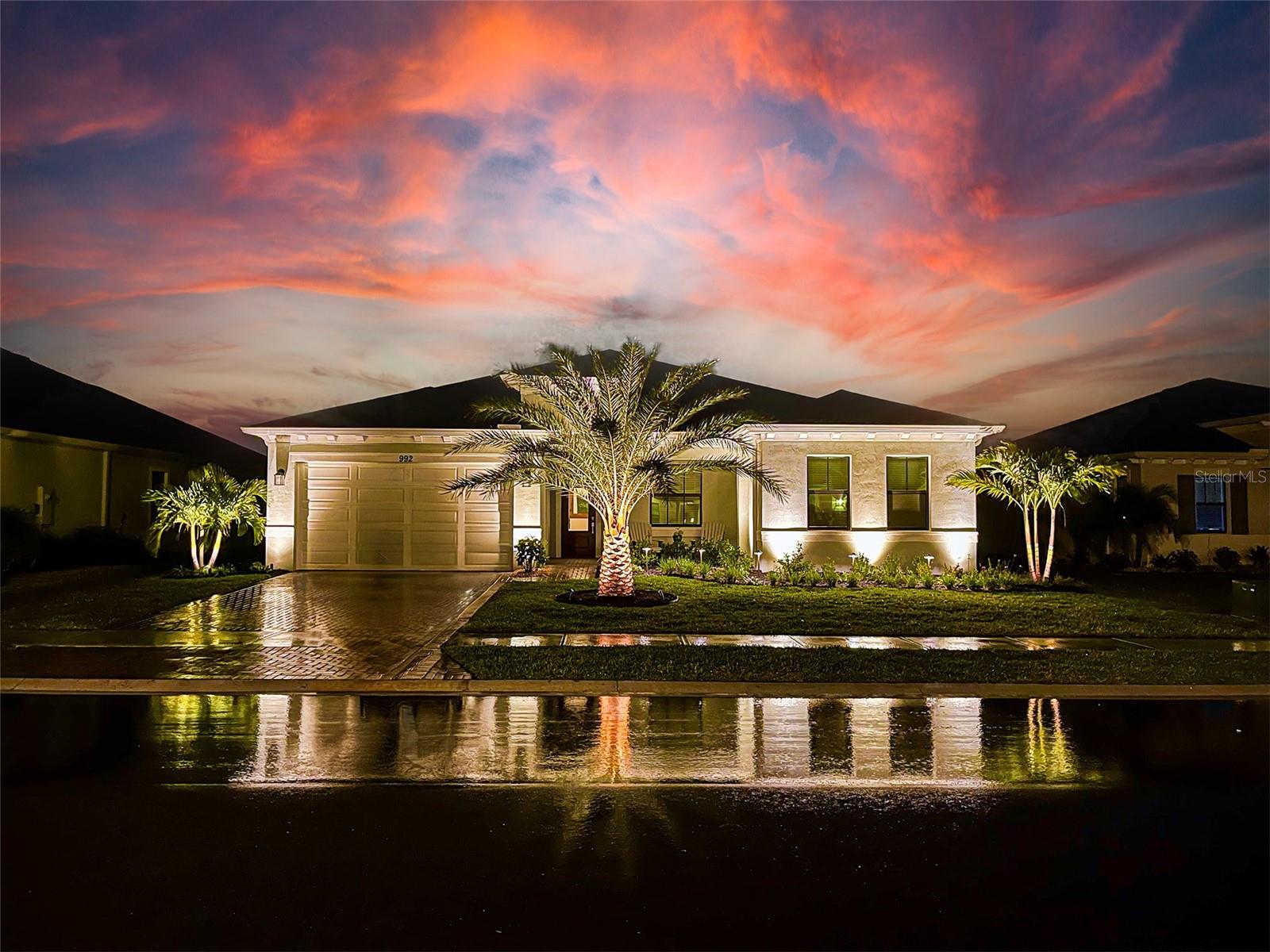 Stunning waterfront home in Bridgewater at Viera - a vibrant 55+ resort-style community offering luxury, comfort, and convenience.
Designed for versatility, the main home offers 3 bedrooms and 2 full bathrooms, while a separate attached in-law suite (ADU) is equipped with its own private entrance, kitchenette, laundry, bedroom, and full bath - perfect for family or guests.
This meticulously maintained home features a spacious open-concept layout, natural light, accented by plank tile flooring throughout, IMPACT WINDOWS AND SLIDERS, and elegant crown molding. The heart of the home is the gourmet kitchen, where entertaining is effortless with a built-in wall oven & microwave, white cabinetry with under-cabinet lighting, tiled backsplash, cooktop with designer hood, walk-in pantry, and a large shiplap-detailed island under pendant lighting.
Step outside to enjoy custom landscaping, lighting, and both front and rear patios equipped with retractable hurricane screening. The garage features epoxy finished flooring, built-in storage, wall organizers, and bike racks for optimal functionality.
Additional upgrades include 50 amp Interlock kit for generator, whole home surge protector, HVAC Reme-Halo Airflow UV Light, custom wall paneling and designer doors in flex room, modern ceiling fans and lighting, all adds comfort and convenience.
Residents of Bridgewater at Viera enjoy access to state-of-the-art clubhouse, resort-style pool, lap pool, spa, tennis and pickleball courts, all just minutes from top rated dining, shopping, and sparkling Florida beaches.