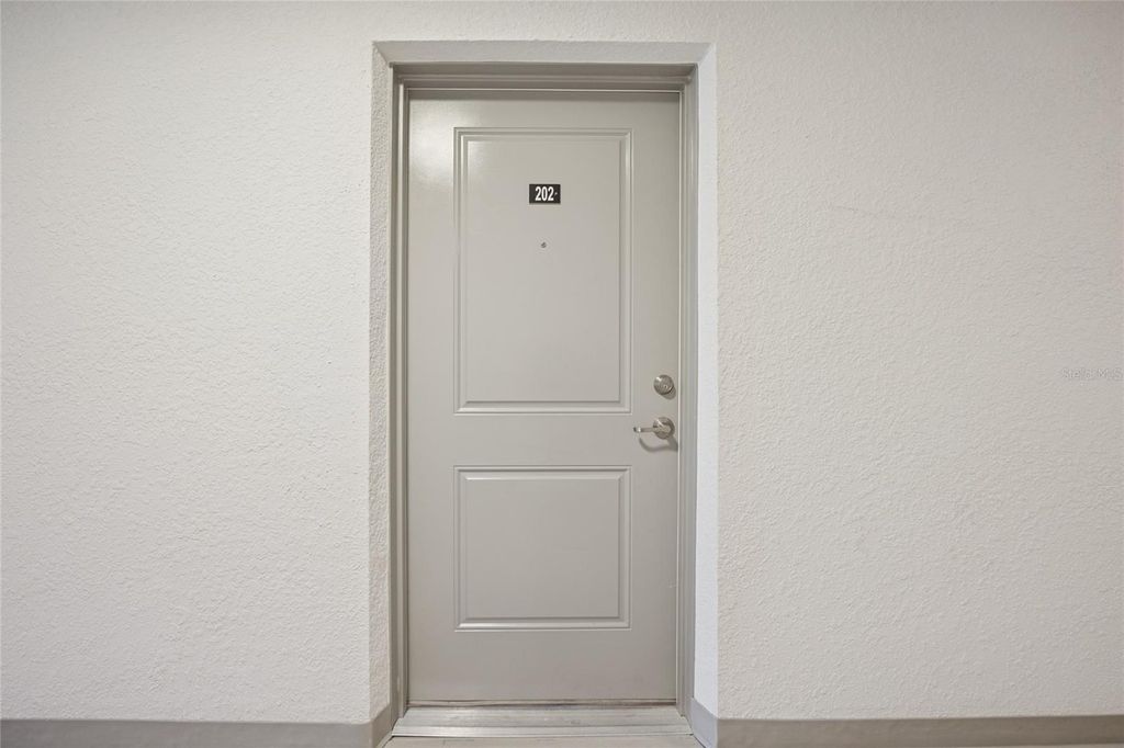 Photo of 1210 Southstation Place #202, Orlando, FL 32809 (MLS # O6366452)