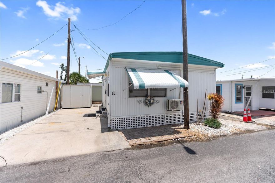 Welcome to your slice of paradise in the highly sought-after 55+ community of Paradise Bay Estates! Offered completely turnkey and move-in
ready, this home is designed for comfort and ease. This delightful 1BR/1BA home features a cozy living area and kitchen with a dining area too. One shed even includes a washer/dryer hookup for added convenience. The main bedroom currently features a queen bed. Plus, a brand-new split system heat/AC was installed in December 2024 after the home received a refreshing update post-hurricanes Helene & Milton. Paradise Bay Estates is an active and vibrant community with fantastic amenities, including a heated pool and spa, pickleball courts, shuffleboard, a boat ramp, and available boat dockage (waitlist applies). There’s always something happening—from potlucks and musical shows to golf outings, community lunches, and music by the bay. Nestled along the picturesque shores of Sarasota Bay, residents enjoy stunning wildlife, charming gazebos, and breathtaking sunsets over Anna Maria Island and Longboat Key. Don’t miss this opportunity to enjoy the Florida lifestyle in a premier waterfront community!