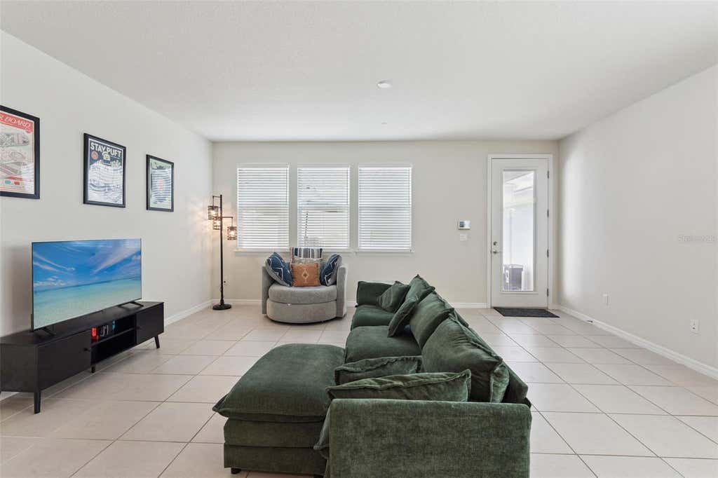 Photo of 6926 Reverie Park Avenue, Orlando, FL 32829 (MLS # O6429057)