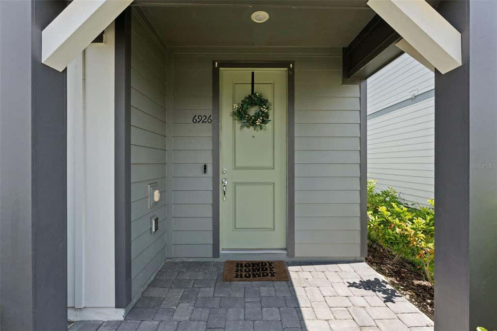 Photo of 6926 Reverie Park Avenue, Orlando, FL 32829 (MLS # O6429057)