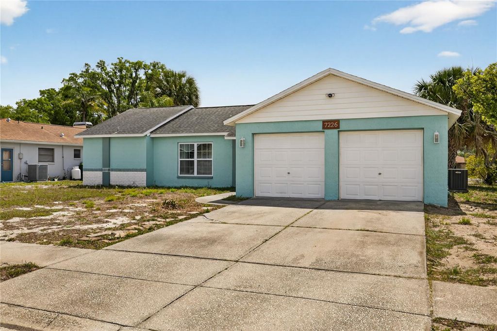 Photo of 7226 Bramblewood Drive, Port Richey, FL 34668 (MLS # TB8491894)