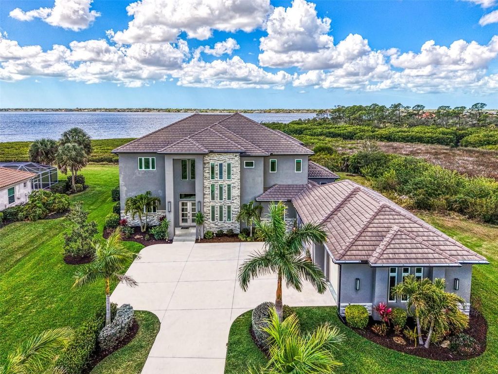 Photo of 3051 Rivershore Lane, Port Charlotte, FL 33953 (MLS # D6146307)