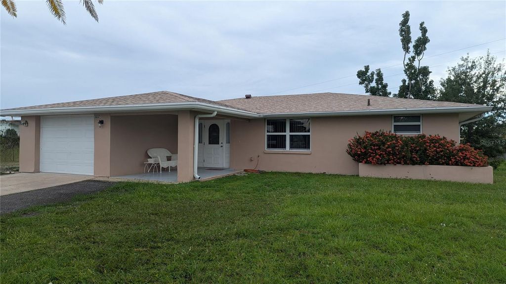 Photo of 3227 Elkcam Boulevard, Port Charlotte, FL 33952 (MLS # C7515170)