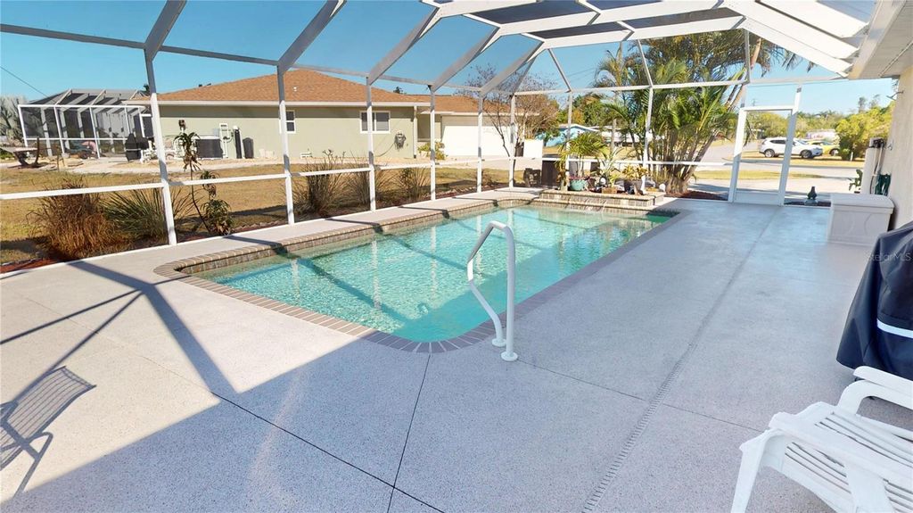 Photo of 115 Dunn Drive NE, Port Charlotte, FL 33952 (MLS # C7517048)