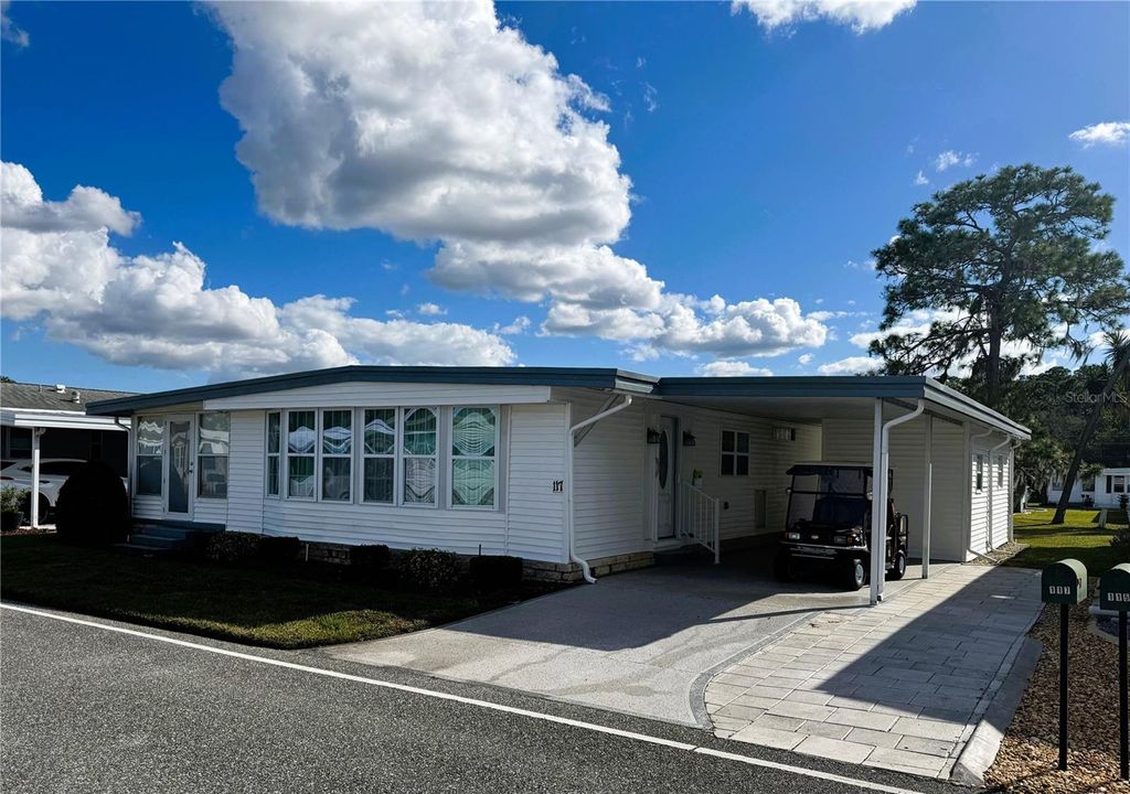 Photo of 117 Dogwood Trail, Leesburg, FL 34748 (MLS # R4910517)