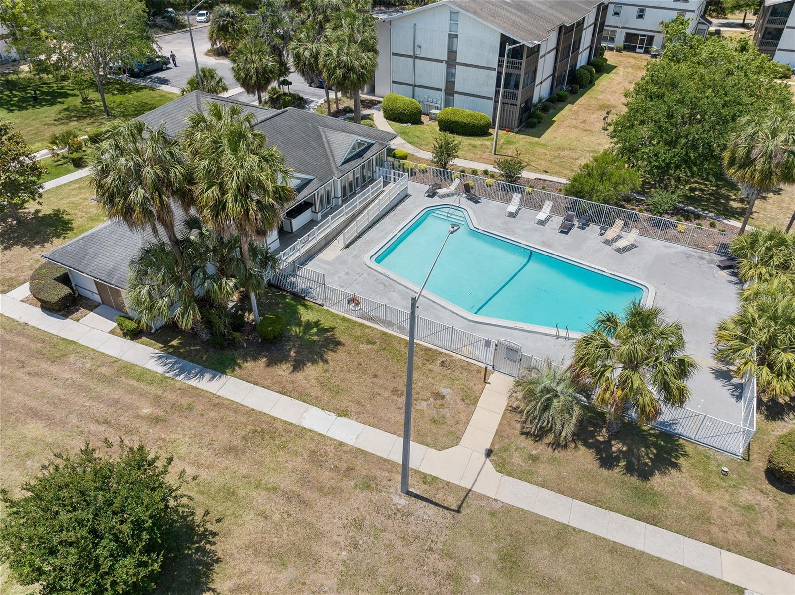 Tucked inside Gainesville’s charming Oaks community, centrally located just steps from the Oaks Mall and North Florida Hospital, this top-floor corner residence offers the space and flexibility that rarely come packaged together. The home has been recently inspected with Gator Home Inspections, and the good-standing report can be utilized for the buyer at their request. Featuring three bedrooms, two bathrooms, and two oversized screened-in balconies, the layout balances cozy indoor living and breezy outdoor comfort. The unit has been immaculately maintained and thoughtfully upgraded: a new roof replaced in 2024, four year old AC and water heater, and a dishwasher that is only two years old. Private in-unit laundry with a 1 year old washer and dryer offers everyday convenience. Thanks to its elevated corner position, natural light pours in from multiple angles, creating a calm and airy atmosphere throughout. With no minimum lease restrictions, this home is Airbnb-friendly and ideal for short-term rentals, offering immediate potential without any red tape. It’s the rare kind of home where everything—from location to condition to income potential—is already in place. Whether you're seeking a primary residence or a turn-key investment, this unit is ready for what’s next. Schedule your showing and experience it in person!