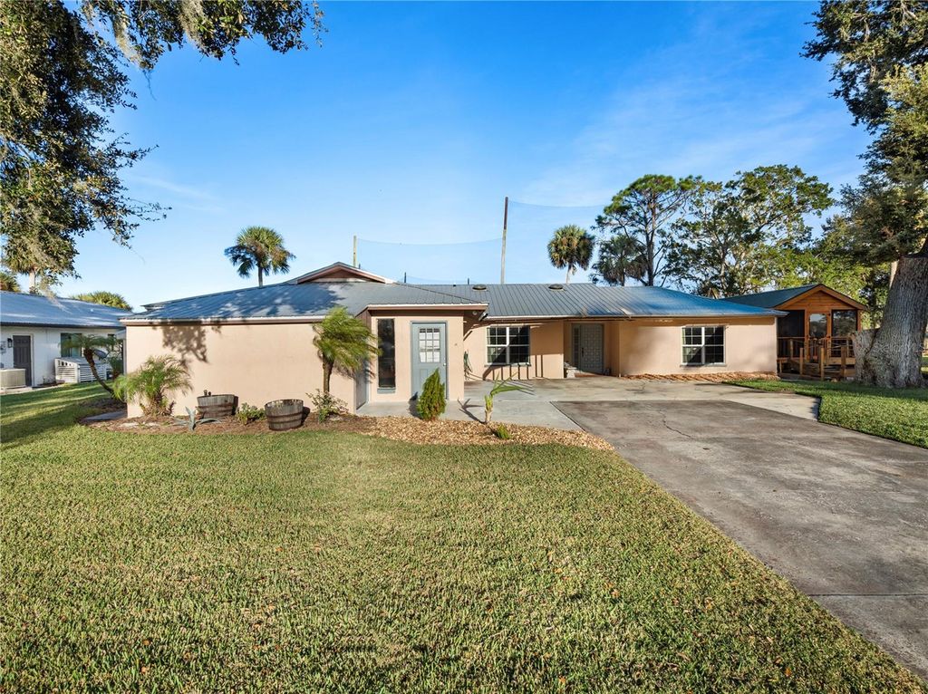 Photo of 715 Fairway Drive, New Smyrna Beach, FL 32168 (MLS # O6359494)