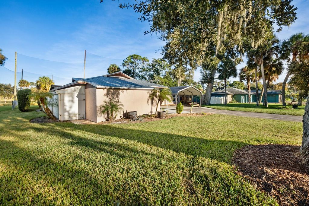 Photo of 715 Fairway Drive, New Smyrna Beach, FL 32168 (MLS # O6359494)