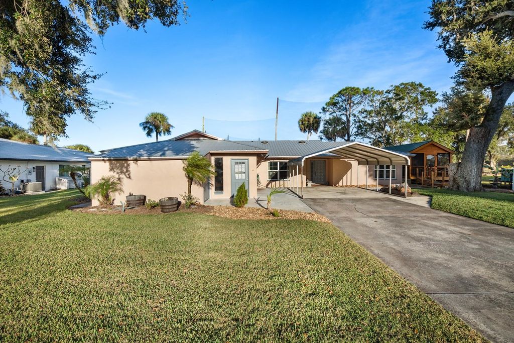 Photo of 715 Fairway Drive, New Smyrna Beach, FL 32168 (MLS # O6359494)