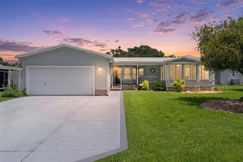 Photo of 705 Oak Boulevard, Wildwood, FL 34785 (MLS # OM731187)